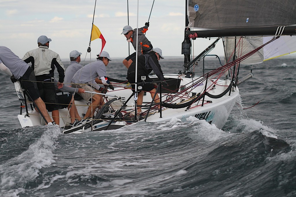 Peter Milner's Melges 32 Well Primed after a gybe.  They were flattened a few minutes later. © Bernie Kaaks